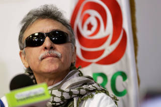 Former commander of Colombia's Marxist FARC Jesus Santrich reacts during a news conference in FARC's headquarters in Bogota