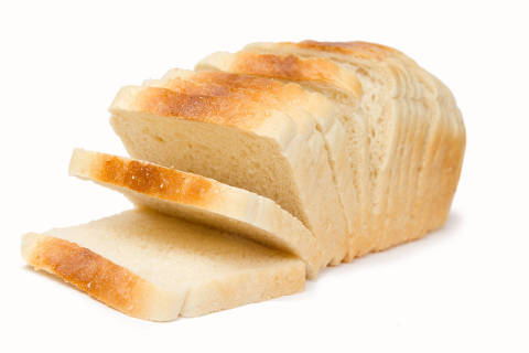 Loaf bread , pão de forma , pão branco , carboidrato . Credito:Linda Vostrovska/Fotolia