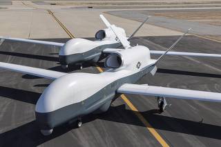 Handout of two Northrop Grumman MQ-4C Triton unmanned aerial vehicles are seen on the tarmac at a Northrop Grumman test facility in Palmdale,