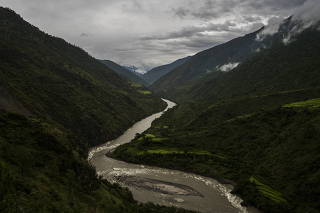 The Dangme River winds through a valley near Mongar, Bhutan.