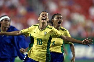 BRAZIL'S SISSI CELEBRATES SCORING THE WINNING GOAL AGAINST NIGERIA