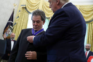 U.S. President Trump presents Presidential Medal of Freedom to economist Arthur Laffer at the White House in Washington