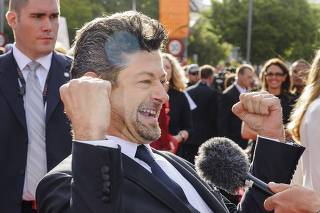 British actor Serkis reacts on the red carpet at the world premiere of 'The Hobbit - An Unexpected Journey' in Wellington