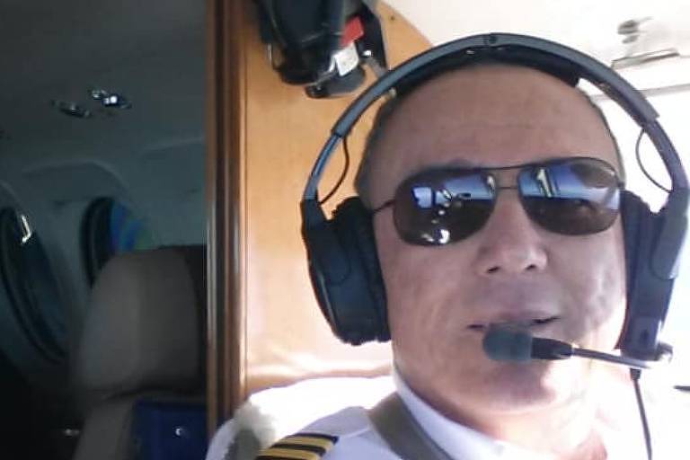 O piloto Benedito Fernando Ricci (a esq.), que teve um infarto e morreu durante um voo