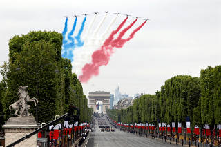 The traditional Bastille Day military parade on the Champs-Elysees Avenue in Paris