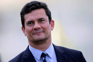 Brazil's Justice Minister Sergio Moro looks on during a ceremony outside the Planalto Palace in Brasilia
