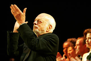 FILE PHOTO: Director Harold Prince applauds during the curtain call of 'The Phantom of the Opera' in New York