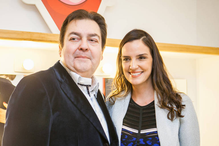 O apresentador Fausto Silva e a esposa Luciana Cardoso