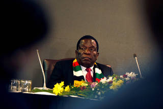 FILE PHOTO: Zimbabwe President Emmerson Mnangagwa attends a meeting with labour unions in Harare