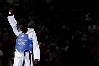 Silva of Brazil reacts after under 68kg taekwondo bronze medal match at Olympics