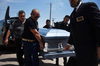 Friends and family gather for a funeral, six days after a mass shooting in El Paso