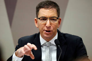 Author and journalist Glenn Greenwald speaks during a meeting at Commission of Constitution and Justice in the Brazilian Federal Senate in Brasilia