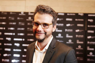 Brazilian director and screenwriter Wagner Moura poses for a picture during the SANFIC International Film Festival in Santiago