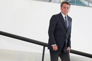 Brazilian President Jair Bolsonaro attends the launching ceremony of the real estate credit program at the Planalto Palace in Brasilia