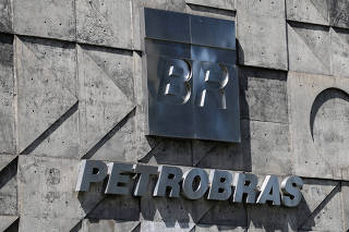 FILE PHOTO: A logo of the Brazil's state-run Petrobras oil company is seen in Rio de Janeiro