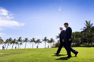 President Donald Trump walks with Chinese President Xi Jinping at Trump?s Mar-a-Lago resort in Palm Beach, Fla., April 7, 2017. (Doug Mills/The New York Times)