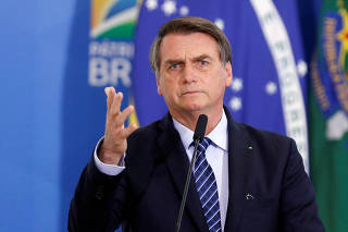 FILE PHOTO: Brazil's President Bolsonaro speaks during a launching ceremony at the Planalto Palace in Brasilia
