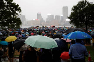 People take part in a general strike at Tamar Park in Hong Kong