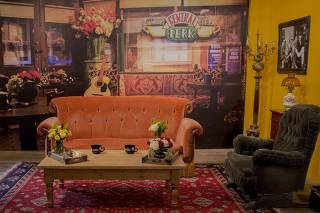 The iconic couch and other props from the fictitious Central Perk Coffee Shop used in the TV show 'Friends' are set up in a store-front in the SoHo section of New York