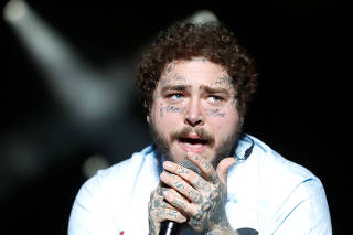 Post Malone performs on the main stage during the Sziget music festival on an island in the Danube River in Budapest