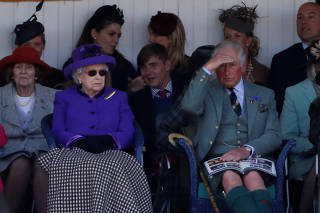 Camila, Duchess of Cornwall, Britain's Queen Elizabeth and Prince Charles attend the annual Braemar Highland Gathering in Braemar, Scotland