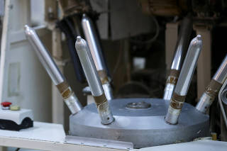 An old condom-making machine is seen in a factory in Buenos Aires