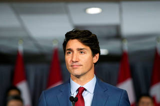 Canada's PM Trudeau speaks during an election campaign stop in Toronto