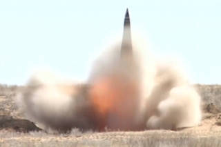 A still image shows the test launch of an Iskander missile at a military shooting range near Astrakhan