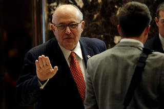 Former New York City Mayor Rudolph Giuliani arrives to meet with U.S. President-elect Donald Trump at Trump Tower in New York