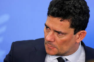 Brazil's Justice Minister Sergio Moro looks on during an inauguration ceremony for the Brazil's new Prosecutor-General Augusto Aras at the Planalto Palace, in Brasilia