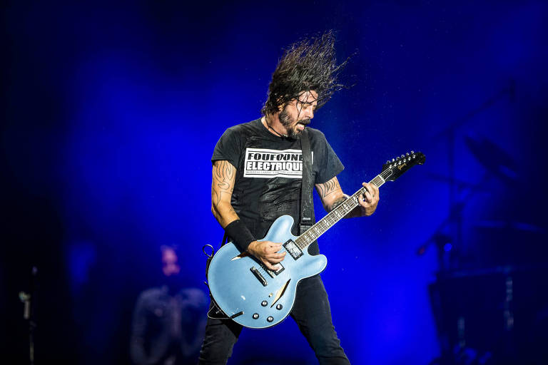 Como será o show de Foo Fighters no The Town após a morte de seu antigo baterista