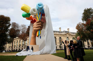 The sculpture Bouquet of Tulips, dedicated to the victims of the Bataclan attack, by American artist Jeff Koons is unveiling near the Petit Palais museum in Paris