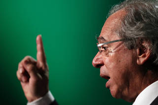 Brazil's Economy Minister Paulo Guedes gestures as he speaks during the Brazil Forum Investment in Sao Paulo