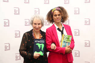 Margaret Atwood poses with Bernardine Evaristo after jointly winning the Booker Prize for Fiction 2019 at the Guildhall in London
