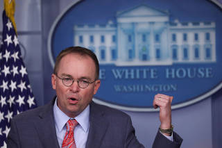 Acting White House Chief of Staff Mulvaney addresses media briefing at the White House in Washington