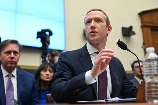 Facebook Chairman and CEO Zuckerberg testifies at a House Financial Services Committee hearing in Washington