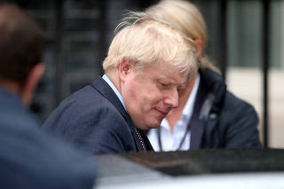 British Prime Minister Boris Johnson is seen outside Downing Street in London
