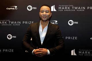 John Legend arrives ahead of comedian Dave Chappelle receiving the Mark Twain Prize for American Humor at the Kennedy Center in Washington