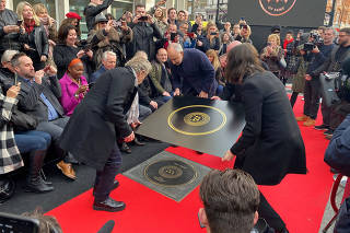 Pete Townshend and Roger Daltrey of The Who attend the unveiling of the founding stone of the new Music Walk of Fame in London