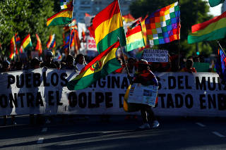 Supporters of Bolivia's ousted President Evo Morales gather outside the U.S. embassy in Buenos Aires to protest against the U.S. government, in Buenos Aires