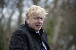 Britain's Prime Minister Boris Johnson visits Healey's Cornish Cyder Farm, in Callestick