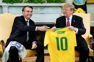 U.S. President Trump meets with Brazilian President Bolsonaro at the White House in Washington