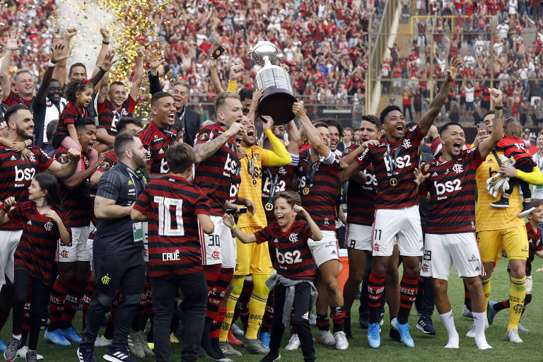 Jogadores do Flamengo comemoram a conquista da Libertadores deste ano sobre o River Plate