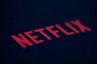 FILE PHOTO: An illustration photo shows the logo of Netflix, the American provider of on-demand internet streaming media, in Paris