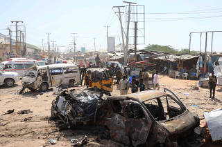 A general view shows the scene of a car bomb explosion at a checkpoint in Mogadishu