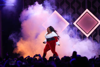 Lizzo performs during the iHeartRadio Jingle Ball concert at Madison Square Garden in Manhattan