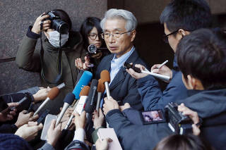 Junichiro Hironaka, chief lawyer of the former Nissan Motor chairman Carlos Ghosn, speaks to reporters in Tokyo