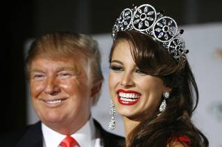 File photo of Miss Universe 2009 Stefania Fernandez of Venezuela standing with Donald Trump during the pageant on Paradise Island