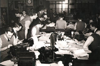 File photo from the Reuters archive shows journalists in the Reuters Newsroom during the 1950 British General Election