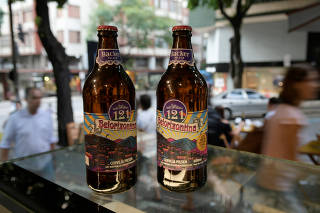 Belorizontina Backer beer bottles are pictured at a restaurant bar in Belo Horizonte